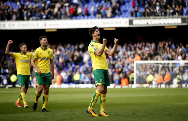 Norwich City players celebrate after victory over Ipswich Town