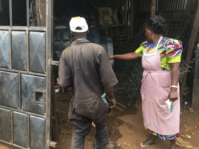 Pamela Akinyi (R) in Kenya