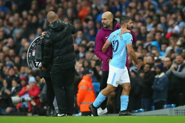 Pep Guardiola embraces Sergio Aguero during Manchester City's 3-0 win over Burnley at the Etihad Stadium.