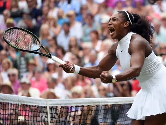 Serena Williams celebrates on court after a set point winner against Angelique Kerber of Germany