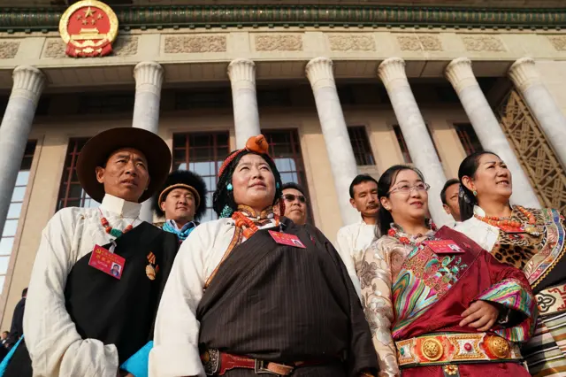 Representative of a minority ethnic group attend the closing of the 19th Communist Party Congress at the Great Hall of the People on October 24, 2017 in Beijing, China.