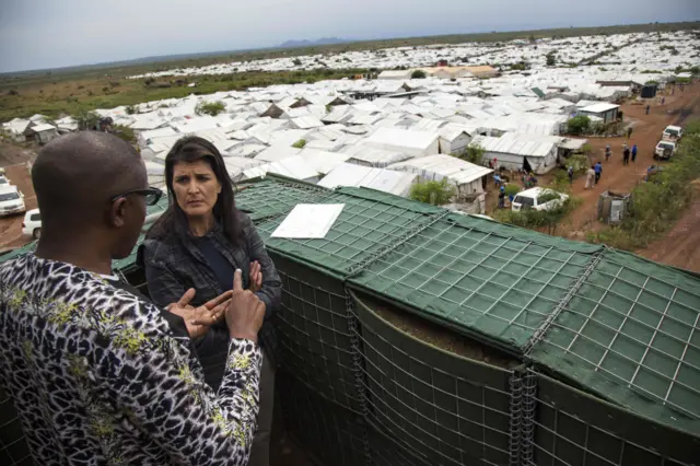 US Ambassador to the United Nations, Nikki Haley (2ndL) talks with a UN official during her visit at the UN Protection of Civilians (PoC) site in Juba, South Sudan, on October 25, 2017.