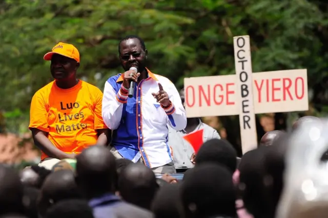 Kisumu governor Anyang Nyongo addresses NASA supporters outside the IEBC (Independent Electoral and Boundaries Commission) offices during protests called for by NASA presidential candidate Odinga to boycott the upcoming elections on October 24, 2017 in Kisumu, Kenya.