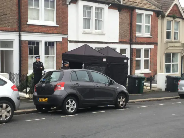 Police tents outside murder house