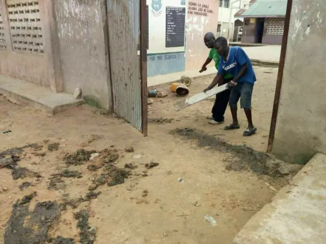 People clear up the human excrement