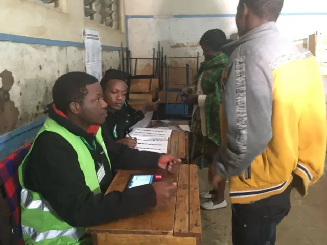 Electoral officials at a polling station in Nairobi, Kenya