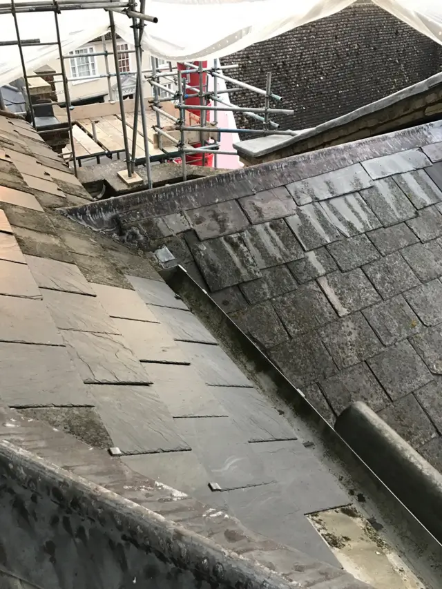 Scaffolding and damaged roof tiles on Eye Town Hall