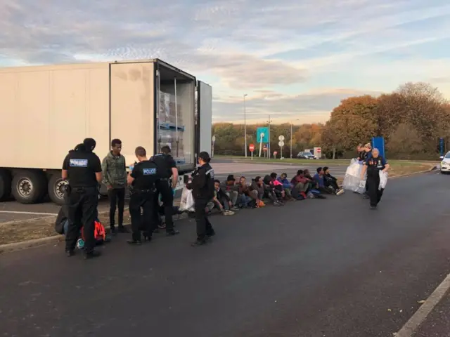 Suspected migrants at motorway services