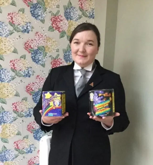 York funeral director, Hayley Owen, with the fireworks which will send ashes into the air