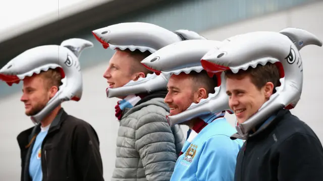 Fans wear sharks heads in honour of Bejamin Mendy