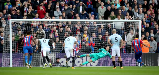 Luka Milivojevic scores a penalty