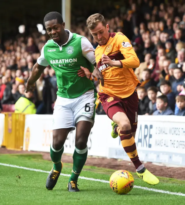 Elliott Frear is tackled by Marvin Bartley