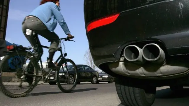 Cyclist and car