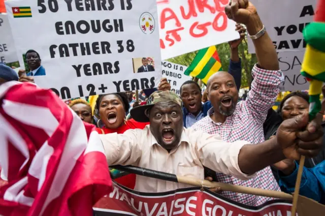 Abdou Razak (C) of Togo demonstrates with others against President Faure GnassingbÃ© in Dag Hammarskjold Plaza outside the UN in New York on September19, 2017