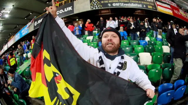 A German fan celebrates