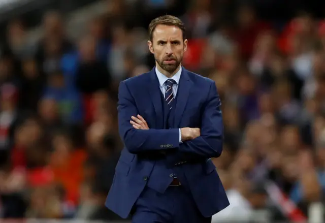 Gareth Southgate looks on