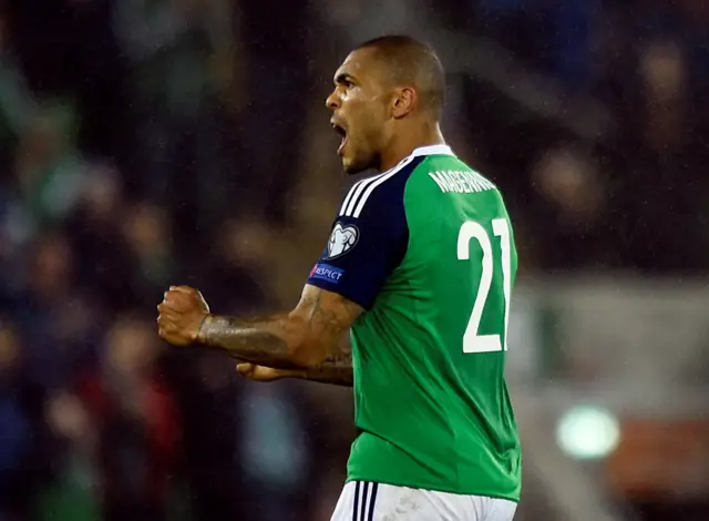 Josh Magennis celebrates