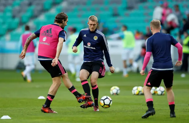 Scotland players warming up ahead of kick off