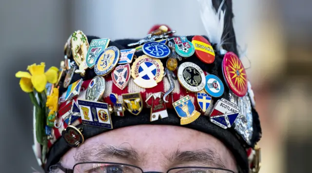 A Scotland supporter's badges from following the national side