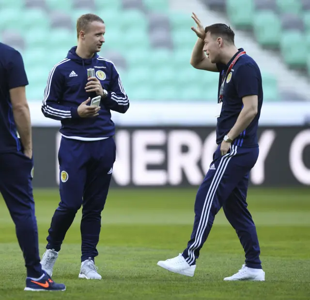 Leigh Griffiths talks to Celtic team-mate Callum McGregor before kick-off