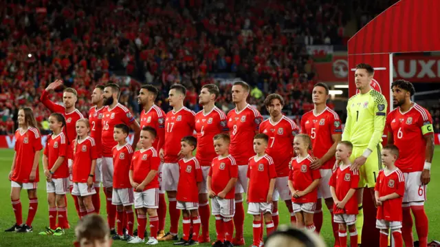 Wales players line up