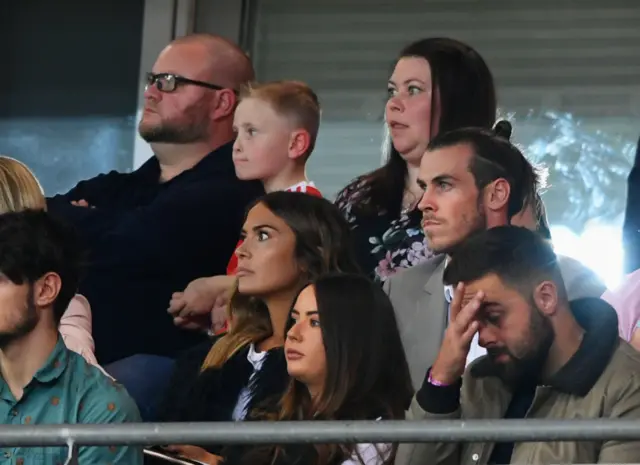 Gareth Barry of Wales watches on