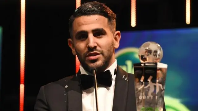 Riyad Mahrez seend holding his 2016 award