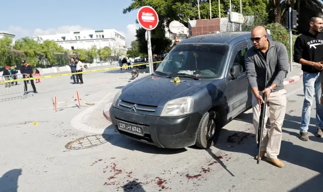 Police officers are seen where a suspected Islamist militant was arrested after wounding two policemen in a knife attack near the parliament building in Tunis, Tunisia 1 November 2017