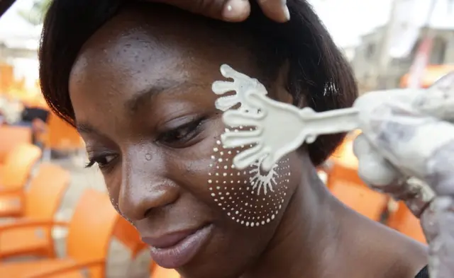 a woman from the Nzema ethnic group celebrating the Abissa, or Question, festival.