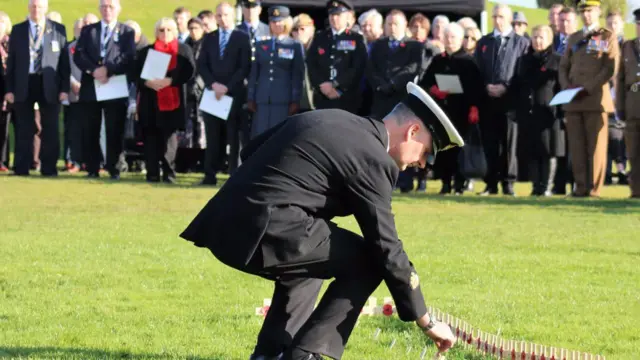 Poppy crosses being planted