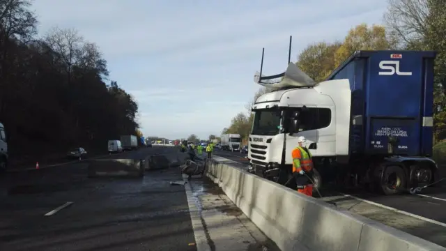 The lorry after the crash and concrete barriers smashed