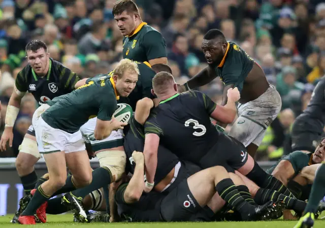South Africa's scrum half Ross Cronje clears the ball
