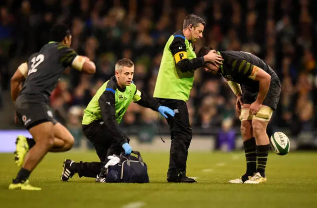 Ireland's Peter O'Mahony receives treatment before being subbed