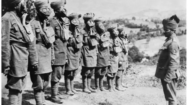 A group of Indian soldiers doing gas mask training in World War One