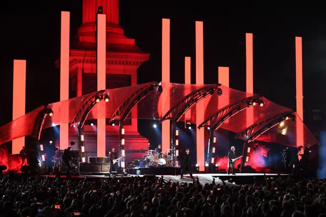 U2 in Trafalgar Square.