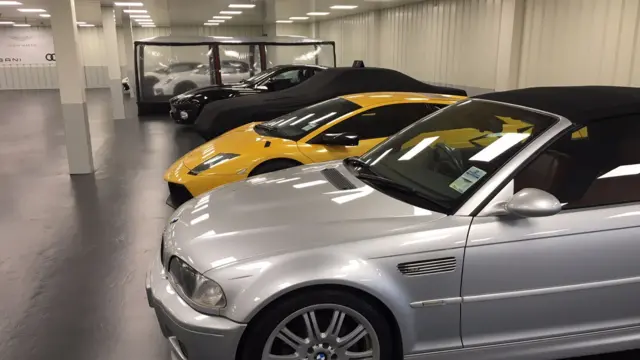 Luxury cars in the Guernsey storage facility