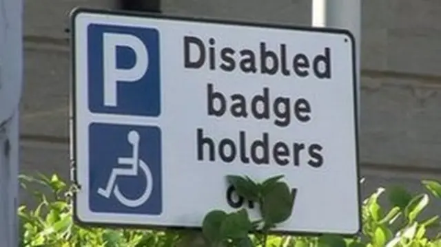 Disabled badge holders sign