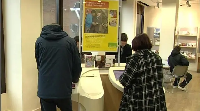 Tow people at the job center.