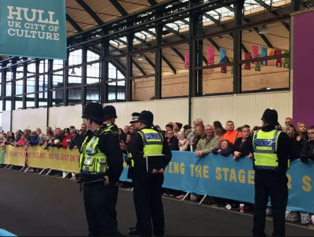 Crowds waiting for the Queen to arrive.