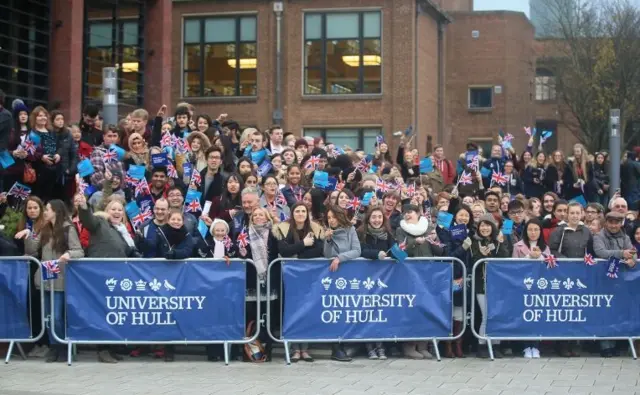 Crowds wait for Queen Elizabeth II to arrive at the University of Hull, during a visit to the city to mark its year as the UK City of Culture.