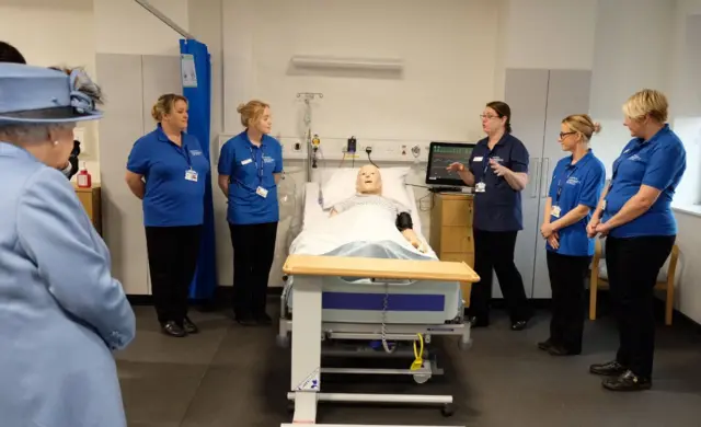 The Queen visiting a simulated ward at the Allam Medical Building.