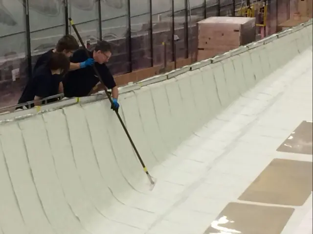 A wind turbine blade being made.