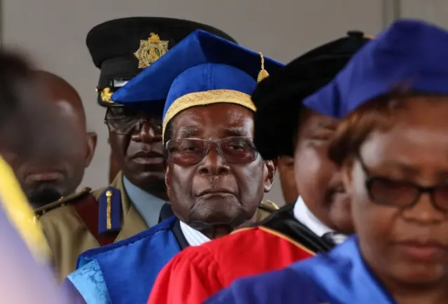 Zimbabwe President Robert Mugabe attends a university graduation ceremony in Harare, Zimbabwe, November 17, 2017