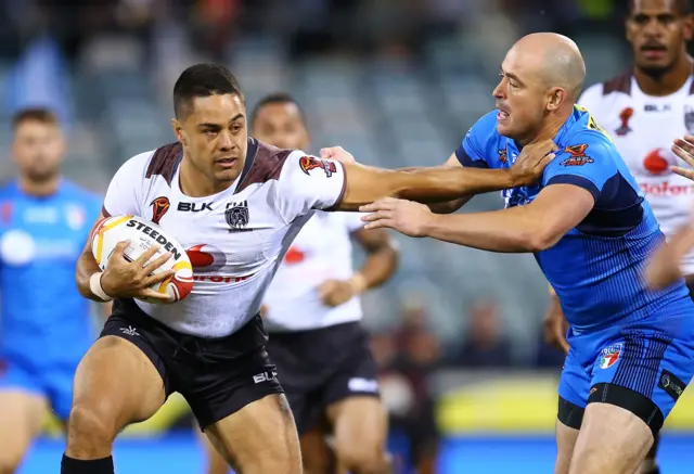 Jarryd Hayne fends away Terry Campese