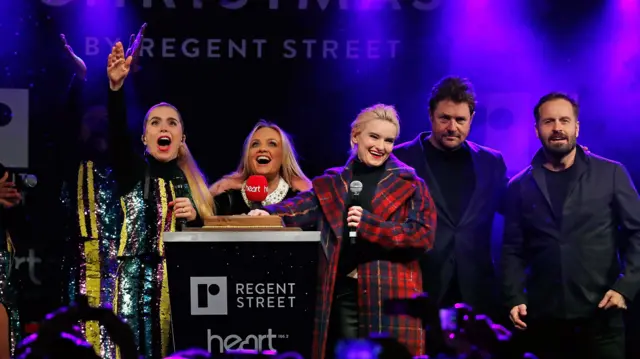 Paloma Faith (l), Emma Bunton, Grace Chatto, Michael Ball and Alfie Boe switch on the Regent Street Christmas lights in London