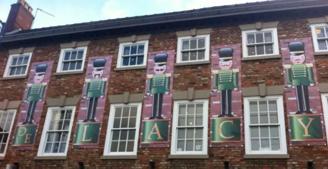 The outside of De Lacy spa with pictures of the Nutcracker on it