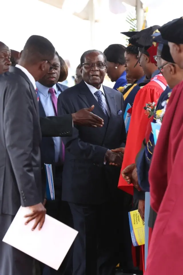 Robert Mugabe (C) makes his first public appearance four days after the Zimbabwe National Army (ZNA) took over control of government in Harare, Zimbabwe, 17 November 2017