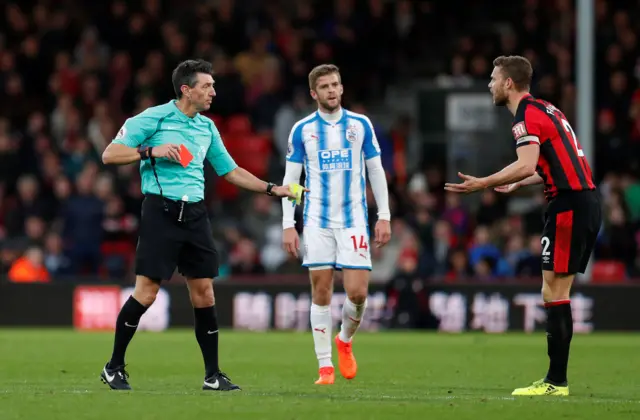 Bournemouth's Francis is shown a red card