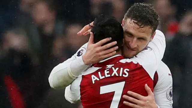 Shkodran Mustafi and Alexis Sanchez