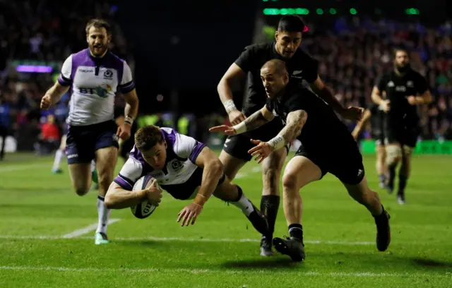 Huw Jones scores a try